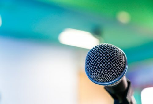 black-microphone-conference-room-filtered-image-processed-v_1232-3311
