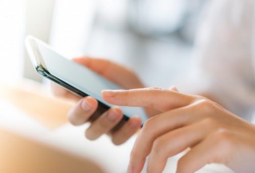 business-hand-with-mobile-phone_1232-4881